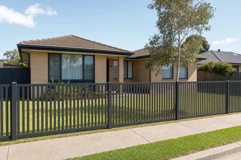 Charcoal blade fence across the front of a Melbourne home